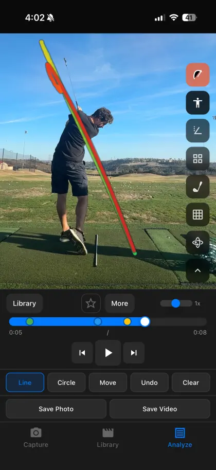 SwingDraw showing a colored club path over the recorded golfer
